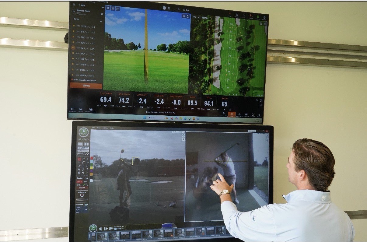 Donnie Breneman using high-speed video and launch monitor data during a lesson.