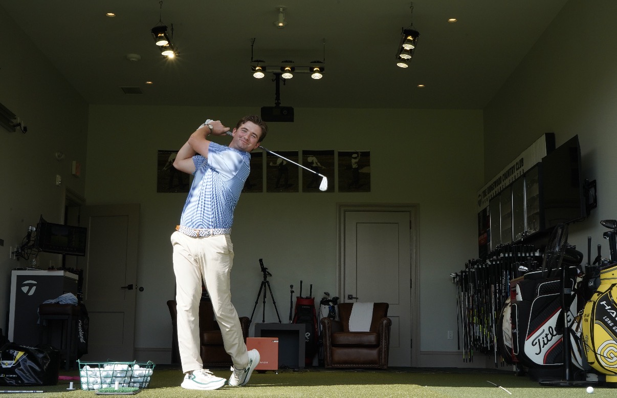 Donnie Breneman at the top of the backswing in the indoor performance center.